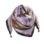 Chèche à breloques porté en foulard