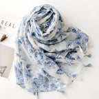 Chèche bleu au motif fleuri