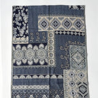 Chèche bleu et noir aux motifs ethniques