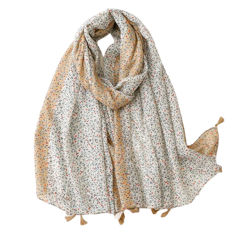 Chèche rehaussé d’un pompon
