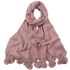 Écharpe accessoirisée d’un pompon