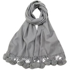 Écharpe avec décoration pompon