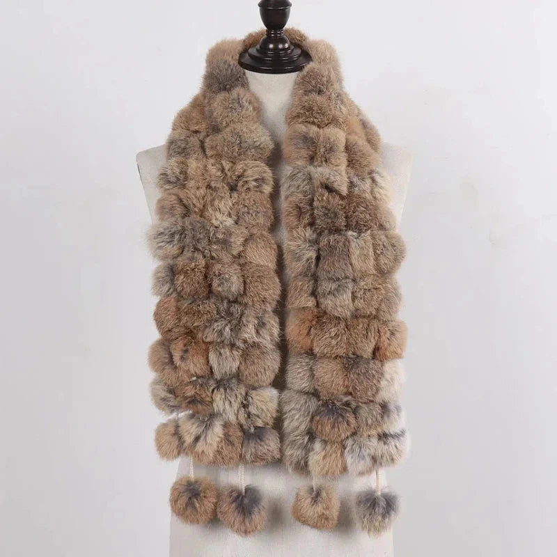Écharpe avec pompon en fourrure