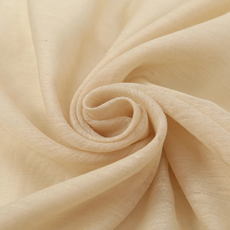 Foulard agrémenté de perles
