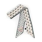 Foulard en forme de bande pour cheveux