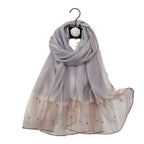 Foulard rehaussé de perles