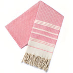 Fouta de plage en coton coloré aux bords frangés