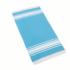 Fouta de plage frangée avec rayures au centre