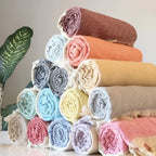 Fouta en matière éponge pour la plage