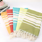 Fouta frangée à rayures centrales pour la plage