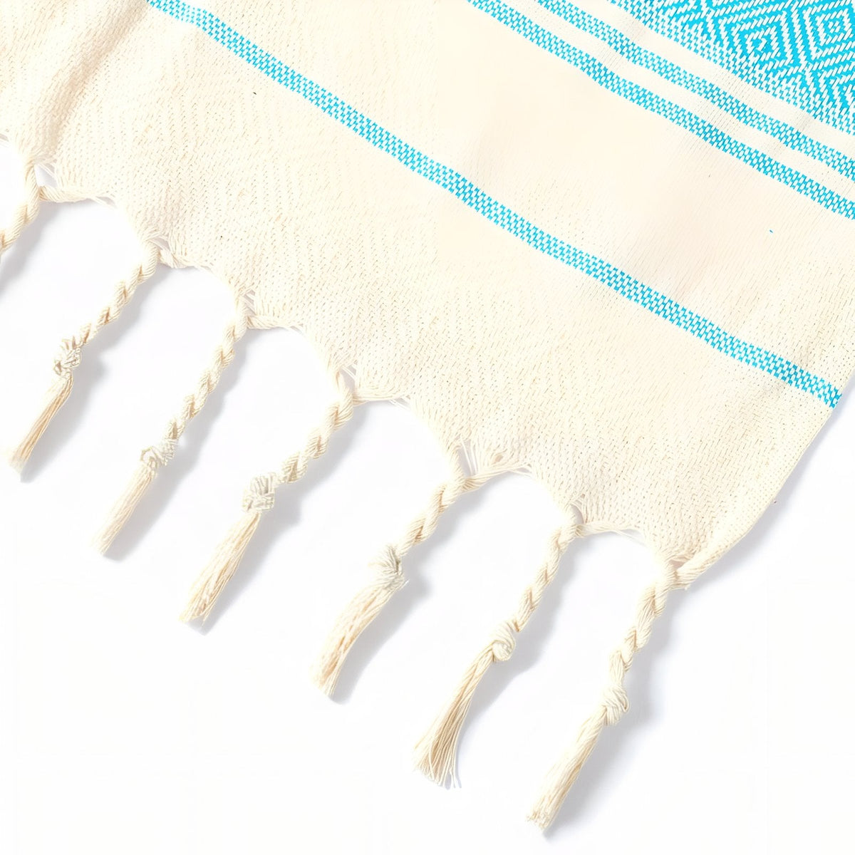 Fouta pour plage à rayures décentrées et franges