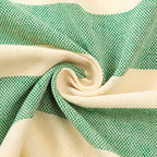 Fouta servant de drap de plage