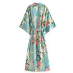 Kimono de plage à larges manches effet floral