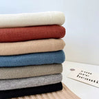 Mini châle confectionné en tricot