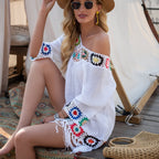 Robe blanche à franges façon paréo