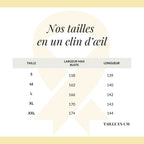 Robe de plage asymétrique blanche dévoilant une épaule